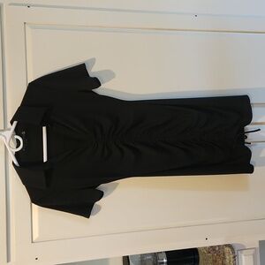 NWOT Alice + Olivia classic black ruched dress.  Never worn.